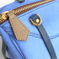 Bolso Gizmo Celeste Serraje